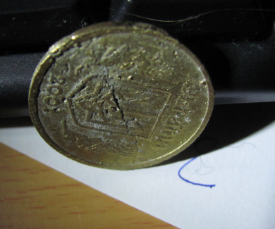 Фальшиві одногривневі монети