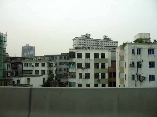 Гуанчжоу — город контрастов: богатые кварталы — бедные дома
