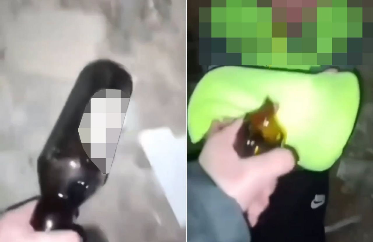 Нападник погрожує потерпілому «розочкою» від пляшки | Джерело: відео з катування